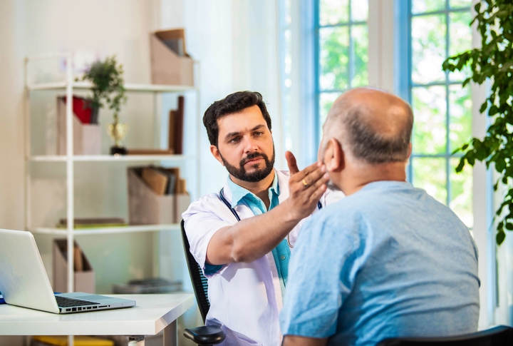 Man has doctor appointment after workers' comp injury